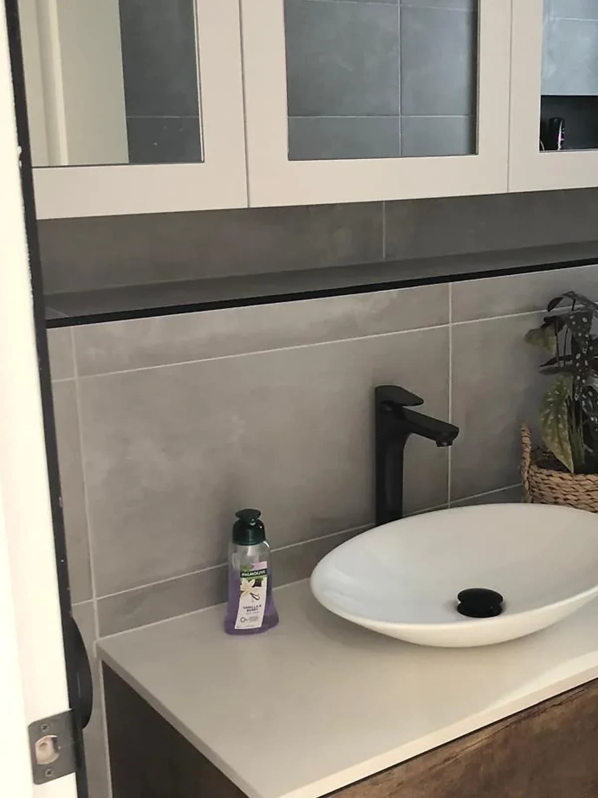 Bathroom vanity with timber cabinetry and round basin by H&R Kitchens